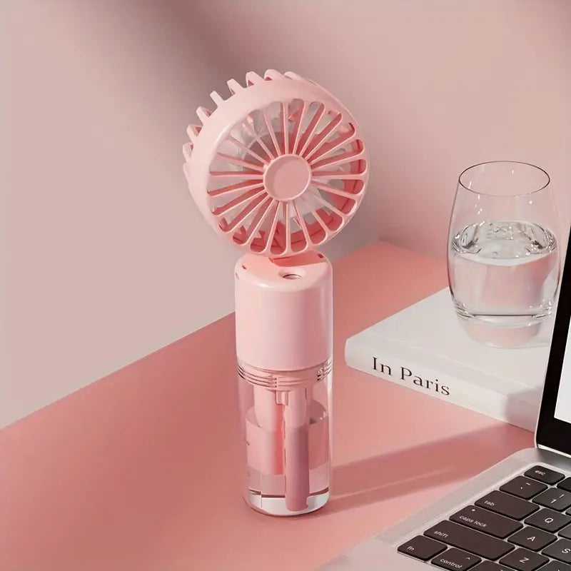 Portable mini fan with mist spray.